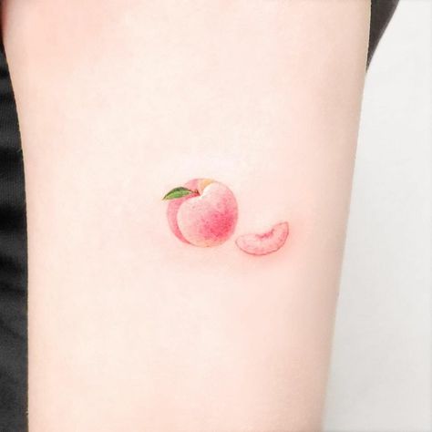 Tiny Peach Tattoo, Peach Tattoo Ideas, Peach Tattoos, Fuzzy Peach, Small Lotus Tattoo, Tattoo Ink Colors, Peach Tattoo, Fruit Tattoo, Tattoo On Hand