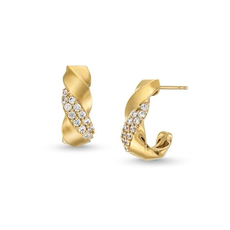 Double rows of sparkling diamonds catch the light in these chic J-hoop earrings. 10K gold Each J-shaped hoop features a sculpted twist and two diagonal rows of diamonds 1/2 ct. t.w. of diamonds Friction backs J Shape Earrings Gold, Baroque Pearls Jewelry, Texture Jewelry, Twisted Hoop Earrings, Bold Jewelry, Jewelry Lookbook, Diamond Hoop Earrings, Jewellery Design, Sparkle Diamonds