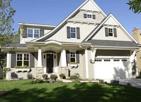 Older neighborhood dwellings guided the color choice for this Midwest home. "We chose a soft neutral... - highmark-builders.com Tan House Exterior Color Schemes, Tan Exterior House Colors, Cottage Siding, Grey House Paint, Siding Colors For Houses, Tan House, Color Combinations Home, Exterior House Colors Combinations, House Paint Color Combination