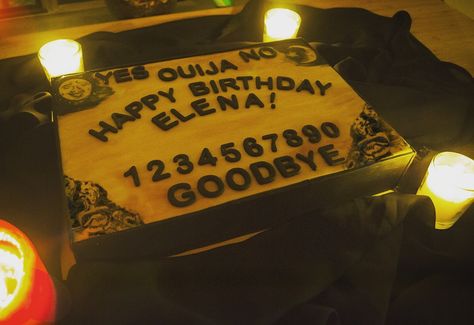 I made a ouija board cake with Devil's food underneath! The drawings on top were done with black gel and a sharp brush. Ouija Board Cake, Ouija Board Birthday Cake, Ouija Board Planchette Table, Ouija Planchette Table, Handmade Ouija Board, Spirit Board Ouija Vintage, Devils Food, Ouija Board, Halloween Birthday