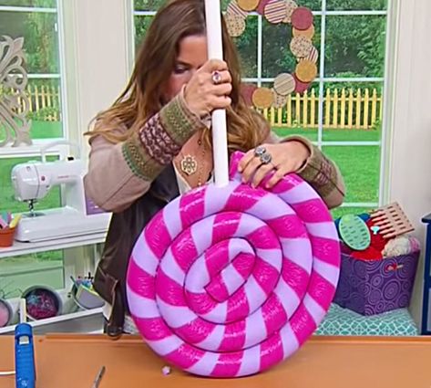 Make this DIY Giant Yard Lollipop out of a pool noodle this Christmas Season Christmas Lollipop Decorations, Diy Christmas Yard Decorations, Lollipop Decorations, Giant Lollipops, Candy Decorations Diy, Christmas Lollipops, Giant Candy, Candyland Christmas, Candy Land Christmas Decorations Diy