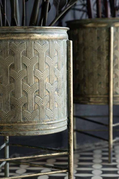 About The Set Of 2 Antique Gold Patterned PlantersThe Set Of 2 Antique Gold Patterned Planters are the perfect base for displaying your houseplants in style. Made from metal with a fabulous geometric pattern across the surface, the plants have an aged gold finish that reminds us of the rustic charm of Verdigris. Designed as a set, the larger raised planter measures H49cm x W31cm x D31cm, while the smaller raised plant pot measures H43cm x W25cm x D25cm. Why We Think You’ll Love The Distressed Go Art Deco Planters, Art Deco Plant Pots, Art Deco Plant, Gold Planter, Raised Planter, Indoor Plant Pots, Large Planters, Instagram Tags, Light Design