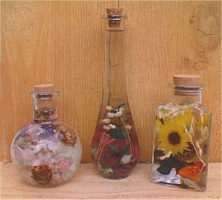 I made this as a kid and it literally sat on my mom's dresser for YEARS looking brand new. Definitely gonna have our kids make this for Christmas this year! Cottagecore Crafts, Decorative Bottles, Flower Bottle, Massage Oils, Flowers In Jars, Spa Room, Glass Bottle Crafts, Beltane, Baby Oil