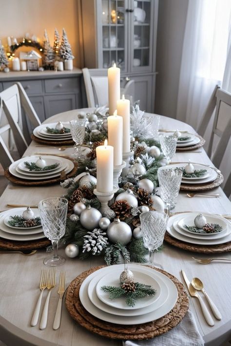 Natural, earthy elements with a cozy, rustic touch. White Silver Table Setting, White And Silver Christmas Table Setting, Winter Wonderland Christmas Ideas, Christmas Plate Decor, Dining Table Christmas Decor Ideas, Winter Wonderland Dinner Party, Christmas Table Settings Silver, Silver Christmas Table Settings, White And Silver Christmas Table