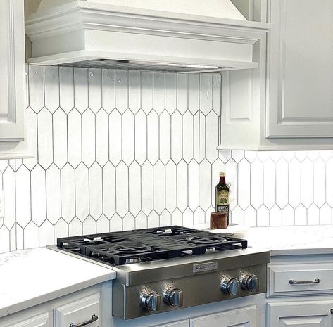 Picket style is a timeless alternative to your otherwise classic subway tile shape! @Emstertile carries several collections with a picket shape including: Concept, Picket, Splash, L’Amour, Charisma, and Craft II to name a few! White Picket Tile Backsplash Black Grout, Vertical Picket Tile Backsplash, Tile Shapes Names, Picket Fence Backsplash Kitchen, Picket Fence Tile Backsplash, Timeless Kitchen Backsplash, Picket Wall Tile, Picket Tile Backsplash, Diamond Backsplash