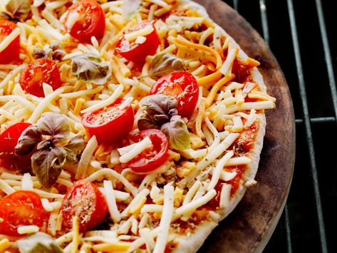 How to Cook Frozen Pizza on the Grill | Dogtown Pizza Frozen Pizza On Blackstone Griddle, Frozen Pizza On The Grill, Frozen Pizza Hacks, Diy Frozen Pizza Freezer Meals, Homemade Frozen Pizza, Family Pizza Night, Thick Crust Pizza, Crispy Crackers, Pizza Ingredients