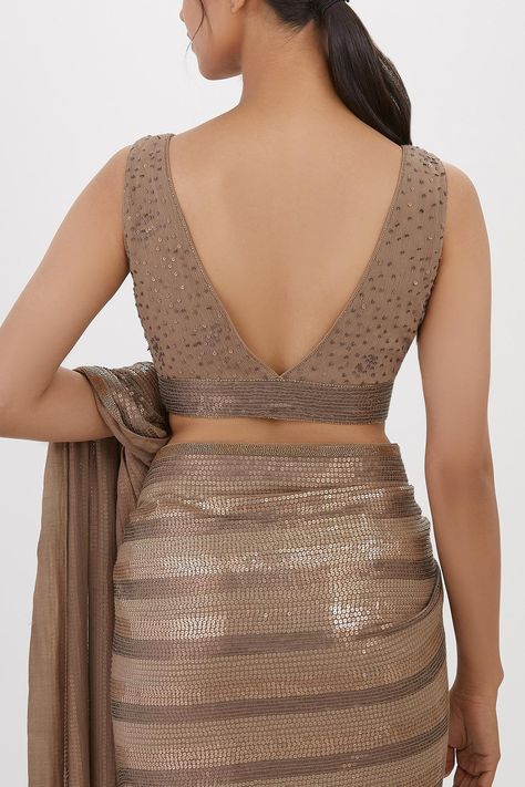 Buy Nakul Sen Grey Chiffon Stripe Pattern Saree With Sleeveless Blouse Online | Aza Fashions Blouse Designs For Sequin Saree, Lehriya Blouse Designs Latest, Trendy Blouse Designs Sleeveless, V Neck Sleeveless Saree Blouse, Stylish Blouse Design Unique Back 2024, Back V Neck Blouse Design, Sleeveless Blouse Designs For Silk Saree, Sleeve Less Blouse Designs, Sleeveless Blouse Designs Saree