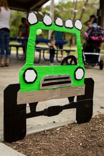 Monster Truck Photobooth  (Duct tape,  cardboard, 2 stakes) Monster Truck Game Ideas, Card Board Monster Truck, Diy Grave Digger Decorations, Cardboard Box Monster Truck, Monster Truck Cutouts, Monster Truck Cardboard Cutout, Monster Truck Photo Prop, Cardboard Monster Truck Track, Diy Monster Truck Party Decorations