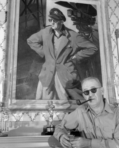 Prolific film director, John Ford, standing in front of a portrait of himself and one of his six Oscars🏆 Are you a fan of Ford's westerns? . . . . . . . . #johnford #oscars #johnwayne #oldhollywood #history #1930s #1940s #oldphotographs #vintagefashion #smokeeveryday #pipesmokingcommunity #handmadepipes #pipemaker #pipemaking #tobaccopipe #tobaccopipes #tobacciana #pipelover #pipeculture #igpc #smoking #pipe #smokingpipe #castellopipes #briarpipe #smokingpipes #artisanpipes #pipecommunity #pipe Happy Birthday John, The Quiet Man, Grapes Of Wrath, Fritz Lang, Wyatt Earp, John Ford, The Searchers, American Western, Best Director