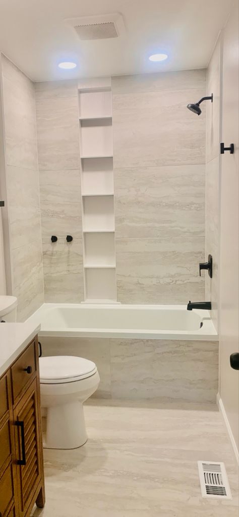 Side By Side Niche, Tub With Tile Walls And Niche, Tile On Front Of Tub, Bath Tiles Ideas Tub Surround, Guest Bath Tile Tub Surround, Tub With Niche Wall, Modern Tub Surround Ideas, Bathtub Niche Ideas Built Ins, Large Tile Tub Shower Ideas