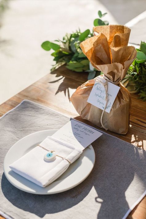 This little evil eye to give a new look to this simple white napkins is a wonderful idea and is also the perfect guest favors for a greek wedding. #evileye  #weddingtabledecoration #woodentable #Weddingfavorsidea #wedddingtablerunner Dinner Place Cards, Greek Wedding Favors, Dinner Place, Guest Favors, Dinner Places, White Napkins, Greek Wedding, Wedding Table Decor, Wedding Dinner