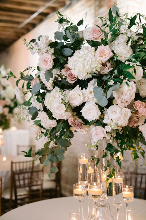 lush hydrangeas and dusty pink roses Dusty Rose Greenery Wedding, Dusty Pink Flower Centerpiece, Eucalyptus And Blush Wedding Table Decor, Blush Sage And White Wedding Flowers, Pink And White Ceremony Flowers, Champagne Pink And White Wedding, Dusty Rose Flower Centerpieces, Dusty Rose Floral Centerpiece, Dusty Pink Tall Centerpiece