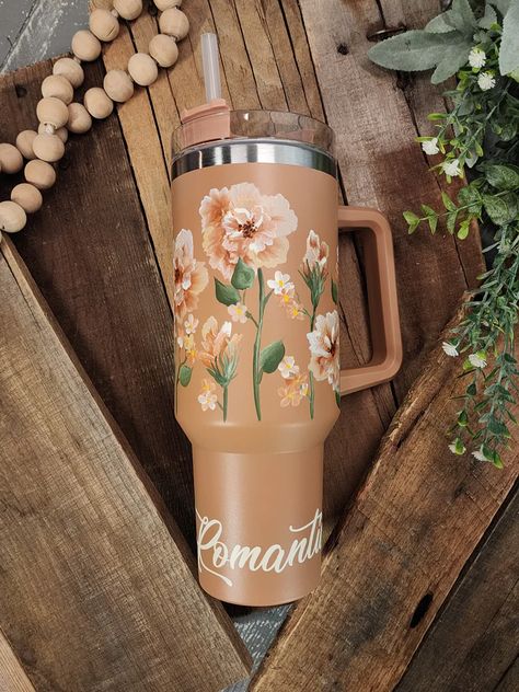 Get ready to elevate your sipping experience with this limited-edition collection!  Each 40oz tumbler with handle is a handpainted floral design that will make you stand out from the crowd.  Each cup is sanded, painted, and sealed with coats of matte spray.   "Romantic" is vinyl along bottom. This tumbler works great f Trendy Water Bottles, Flowers Romantic, Eco Friendly Art, Hippie Homes, Painted Cups, Etsy Christmas, Tumbler With Handle, 40oz Tumbler, Hand Painted Flowers