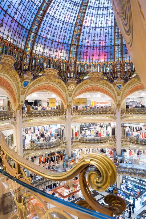 Partez faire votre shopping dans le mythique grand magasin des galeries Lafayette Paris Hausmann, vous y trouverez le meilleur de la mode et du luxe dans un magnifique décor du 20ème siècle. © MyrMuratet Lafayette Paris, Galerie Lafayette Paris, City Lights, Eiffel Tower Inside, Old Money, Eiffel Tower, Fair Grounds, Concept Art, Paris