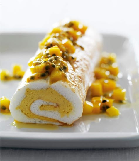 MANGO AND PASSIONFRUIT MERINGUE ROULADE - Chef's Pencil Passion Fruit Meringue, Fruit Meringue, Random Desserts, Mango And Passionfruit, Meringue Roulade, Roulade Recipe, Fancy Foods, Pavlova Recipe, Wine Pairings