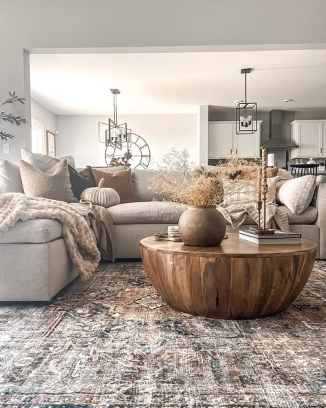 Discover rustic accents, warm color palettes, and inviting setups that will make your living space feel like a snug retreat this season. #FallDecor #CozyHome Credits: @living_delcidly Grey Couch Brown Coffee Table, Rugs With Grey Sofa, Grey Floor Living Room Ideas Cozy, Light Gray Couch Living Room Ideas Cozy, Sw Zircon, Gray Couch Rug Ideas, Small Sectional Living Room, Vase Styling, Cozy Modern Farmhouse Living Room