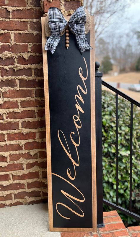 Front Welcome Sign, Black Porch Sign, Little Front Porch Ideas, Welcome Door Leaner Signs, Black Door Hanger Sign, Front Porch Simple Decor, Door Welcome Ideas, Front Porch Leaning Sign, Spring Leaner Boards