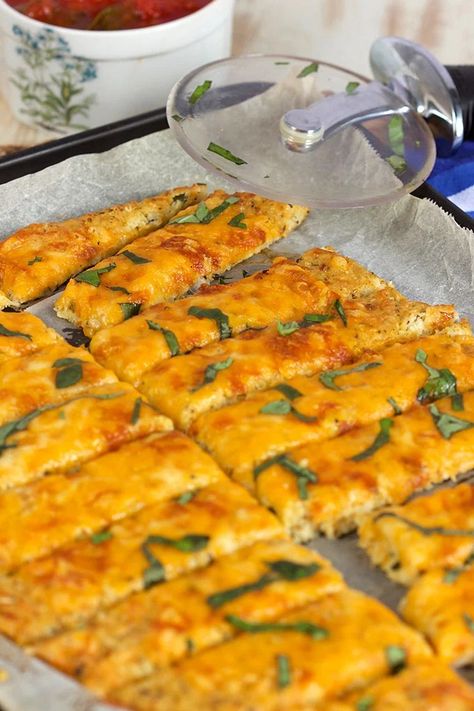 Easy Cheesy Cauliflower Breadsticks Recipe Easy Cheesy Cauliflower, Breadstick Recipe, Cauliflower Breadsticks, Breadsticks Recipe, Cheesy Breadsticks, Bread Sticks Recipe, Cheesy Cauliflower, Baked Cauliflower, Easy Cheesy