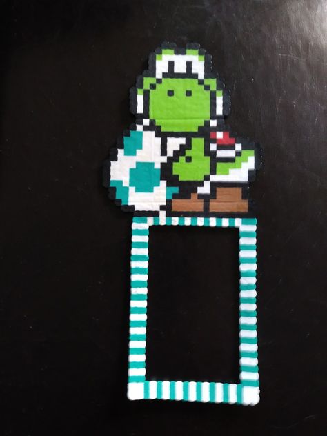 Perler Beads Yoshi light switch cover Perler Bead Patterns Light Switch Cover, Perler Switch Cover, Perler Bead Switch Cover, Perler Light Switch Cover, Light Switch Perler Beads, Perler Beads Nintendo Switch, Perler Beads Light Switch Frame, Perler Bead Light Switch Frames, Hama Beads Light Switch Frame