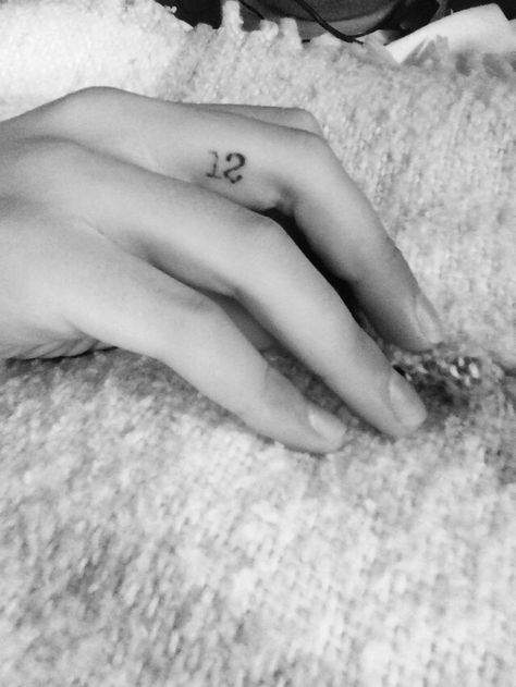 Small finger tattoo.. Date 12/9/1997 Between Finger Tattoo, In Between Finger Tattoo, Small Finger Tattoo, Tattoo Date, Year Tattoo, 12 Tattoos, Small Finger Tattoos, Finger Tattoo, Finger Tattoos