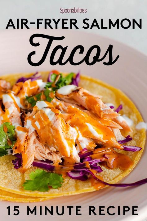 15-minute air fryer salmon tacos with spicy chipotle sauce is a light & satisfying quick lunch, light dinner, or midnight snack recipe. Make easy healthy salmon tacos using an air fryer, and load up with slaw, and Mexican crema. We’ll also tell you all you need to know about chipotle peppers, fish taco sauces, and how to pick the best piece of salmon. #salmon #salmontacos #chipotlesauce #airfryer #tacorecipe #fishtaco via @Spoonabilities Taco Sauces, Easy Healthy Salmon, Spicy Chipotle Sauce, Salmon Fish Tacos, Salmon Tacos Recipe, Fish Taco Sauce, Air Fryer Salmon, Mexican Crema, Salmon Tacos