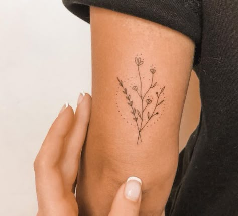 Minimalist Tattoo Back Of Elbow, Tiny Wildflower Tattoo Simple, Womens Above Elbow Tattoo, Small Tattoo Back Of Arm Above Elbow, Minimalist Tattoo Floral, Tricep Tattoos Women Fine Line, Back Of Elbow Flower Tattoo, Back Arm Tattoo Women Minimalist, Cute Simple Arm Tattoos For Women