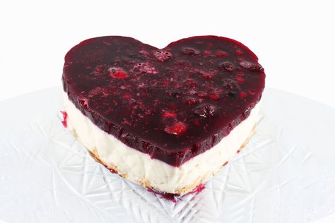 This delicious heart-shaped cheesecake is the perfect way to show your loved ones how much you care. Topped with a layer of sweet raspberry jelly, this creamy and decadent dessert will be the star of your next gathering! #cheesecake #jelly heart #jelly #strawberry jelly hearts cheesecake #jellyy heart cake #jelly hearts cake #strawberry cheesecake #heart shaped cheesecake #cheesecake recipe #heart shape jelly #heart shape jelly #strawberry jelly hearts cake #heart shape cake #cheesecake #cakes Anniversary Heart-shaped Diamond Ring, Heart Shaped Anniversary Ring With Pave Setting, Heart-shaped Anniversary Rings With Diamond Accents, Hallmarked Heart-shaped Diamond Ring For Anniversary, Heart Shaped Cheesecake, Anniversary Cake Heart Shape, Cake Heart Shape, Jelly Strawberry, Cheesecake Cakes