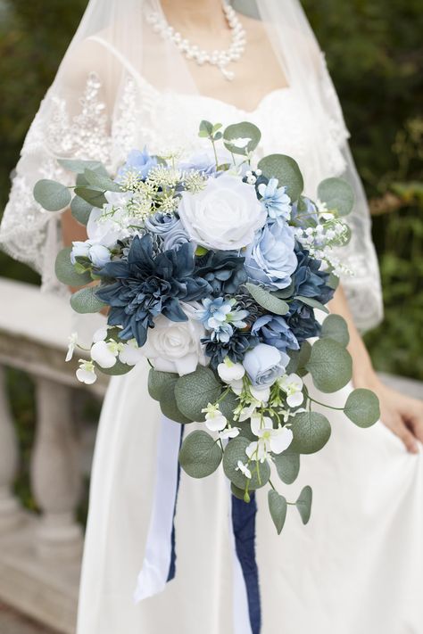 PRICES MAY VARY. Size: 17 inches high, 11 inches in diameter. Materials: The bridal bouquet is made of white rose, dusty blue roses, navy blue dahlia, gardenia, anemone, narcissus, dotted with eucalyptus and orchid. Gorgeous Dusty Blue Wedding Color Theme：Blue is always a pupular colour palette for wedding throughout the year. Our designer puts up together beautiful white, dusty blue, navy blue, grey and green colour palette for you.  It can create a stylish and fresh look or a more gorgeous and Dusty Blue Wedding With Gold, Dusty Blue And Sage Green Bridesmaid Bouquet, White Navy Wedding Theme, Navy Blue Beige Wedding Theme, Boho Wedding Blue Color Palettes, Azure Blue Wedding Theme, Wedding Ideas Colours, Dusty Blue And Blush Bouquet, Dusty Blue And Sage Green Bridal Bouquet