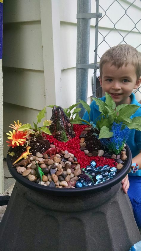 My dinosaur garden! The boys didn't want a fairy garden so we did a dinosaur garden with a volcano and hostas:) Dinosaur Fairy Garden, Dinosaur Garden, Boho Whimsical, A Dinosaur, Whimsical Garden, Garden Crafts, Crafts Ideas, The Boys, Volcano