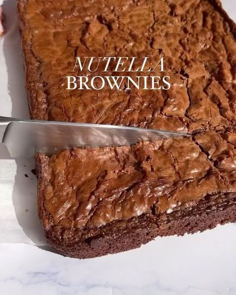 Chocolate | Desserts on Instagram: "Nutella brownies 🎥 by @kitchen_bythesea Follow @chocolaeite for more🍫 The secret ingredient to do this? Nutella. These Nutella brownies have all the qualities we look for in a great brownie. They are chewy, fudgy, chocolaty and incredibly delicious.  For full Nutella brownies recipe visit https://kitchen-by-the-sea.com/nutella-brownies/ . . . #brownies #chocolatebrownies #chocolatedesserts #chocolate #chocolatebaking #brownielovers #brownielovers #brownierecipe #homemadebrownies #easybaking #nutella #nutellabrownies #nutellabrownie" Nutella Brownies Recipe, Recipes For Brownies, Nutella Recipes Brownies, Nutella Brownies, Usa Food, Homemade Brownies, Brownies Recipe, Food Shows, Chocolate Baking