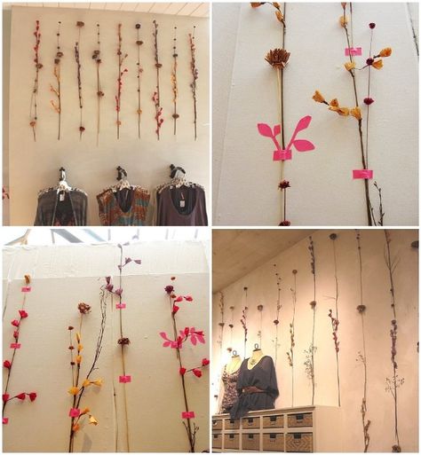 Love the pink tape used to hang all the beautiful wood and flowers on this wall <3 Free People Decor, Fall Store Displays, Window Screen Crafts, Fall Displays, Free People Fall, Autumn Display, Free People Store, Free People Clothing Boutique, Wooden Flowers