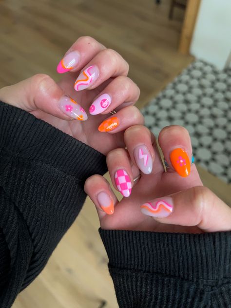 Pink Orange Checkered Nails, Cute Nails Pink And Orange, Non Basic Nail Ideas, Spicy Nails Acrylic, Orange And Pink Spring Nails, Orange Pink And Red Nails, Groovy Smiley Face Nails, Pink Or Orange Nails, Nails Neon Pink And Orange