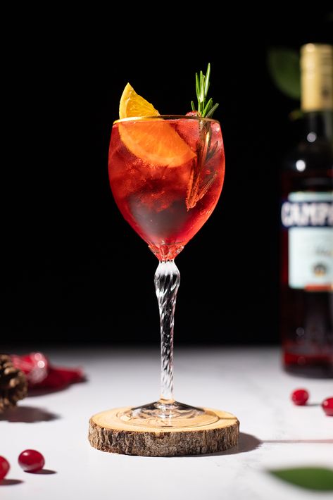 Cranberry Campari Spritz (Easy Christmas Cocktail Recipe) - Moody Mixologist Campari Prosecco Cocktail, Italian Christmas Cocktails, Martini Rosso Cocktails, Christmas Spritz Cocktail, Campari Drinks, Easy Christmas Cocktail, Moody Mixologist, Campari Cocktail, Cranberry Cocktail Recipe