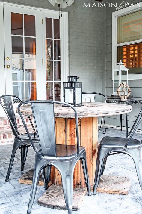 LOvE This combo of industrial chairs and electrical wire spool! Perfect mix.   Easiest way to waterproof outdoor wood furniture ever! maisondepax.com Waterproof Outdoor Furniture, Outdoor Table And Chairs, Spool Furniture, Spool Tables, Wire Spool, Outdoor Wood Furniture, Industrial Chair, Wood Spool, Wood Patio Furniture