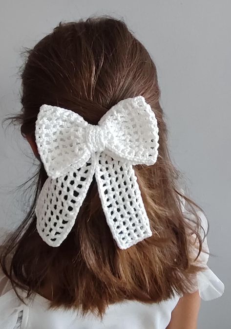 Elevate your style with our elegant crochet bow hair clips, perfect for both adults and kids. Handcrafted with attention to detail, these charming hair accessories combine the classic bow design with the soft texture of crochet, adding a touch of sophistication to any hairstyle. Whether you're dressing up for a special occasion or simply adding a bit of flair to your everyday look, these versatile hair clips are a timeless addition to any wardrobe. Available in a range of colors and sizes, they' Crochet Hair Bows, Kids Knitting, Accessories Elegant, Crochet Bow, Elegant Crochet, Crochet Bows, Hair Accessories Collection, Bow Hair Clip, Bow Hair Accessories