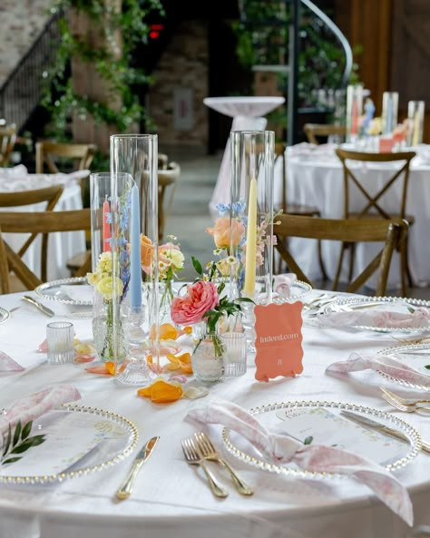 Texas Florist | Bobbi Padgett | you kidding me 🥲 these pastel tapers added so much to this tablescape!! A sweet bud quartet paired with a trio of taper candles is one of... | Instagram Pastel Wedding Round Table, Alternating Table Centerpieces, Simple Pastel Centerpieces, Pastel Round Table Decor, Outside Wedding Table Set Up, Bud Vases And Taper Candles Centerpiece, Wedding Table With Taper Candles, Handmade Wedding Table Decorations, Wedding Colorful Centerpieces