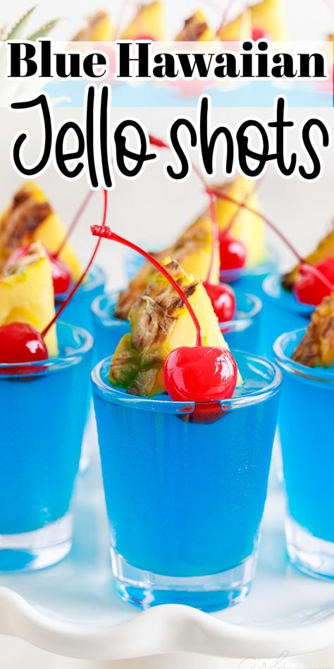 This simple recipe for blue Hawaiian jello shots combines Malibu rum with pineapple juice, blue Curacao, and berry gelatin topped with fun garnishes! Hawaiian Jello Shots, Raspberry Jello Shots, Alcohol Jello Shots, Blue Hawaiian Jello Shots, Rum Jello Shots, Blue Jello Shots, Jello Shots Recipe, Peach Jello, Pineapple Jello