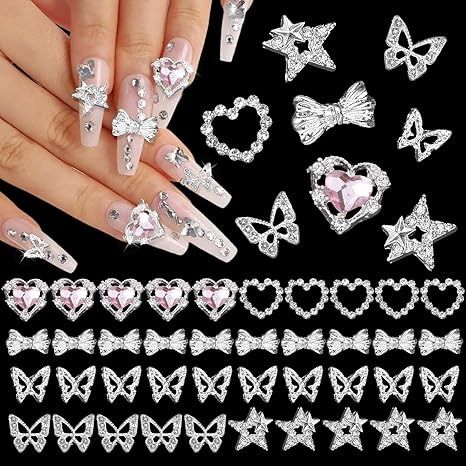 Amazon.com: 40 PCS 3D Silver Nail Gems Charms Nail Alloy Charms, Butterfly Hollow Heart Star Pentagram Bow Bowknot Metal Nail Rhinestones+Heart Diamond Nail Art Jewels Charms for Nail Art DIY Design : Beauty & Personal Care Diamond Nail Designs Rhinestones, Nail Designs Rhinestones, Heart Nail Charm, Nail Art Jewels, Gems For Nails, Nail Heart, Stars Nails, Diamond Nail Designs, Nail Diamond