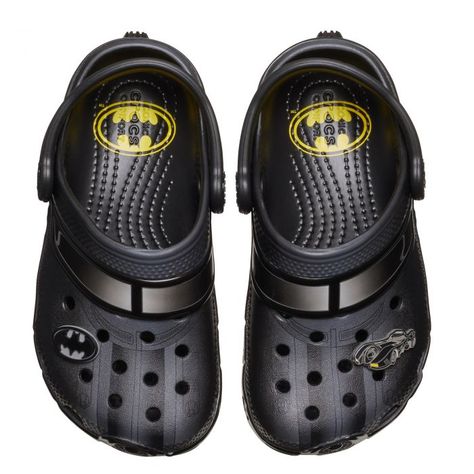 Imagine a pair of Crocs that zoom straight out of Gotham City, specially designed for the smallest superheroes. These kids Batmobile-inspired Crocs are a miniature marvel, with sleek black silhouettes that echo the iconic vehicle's vibe. The rugged, tire-tread soles are ready to conquer any playground, while the Bat-symbol charm on the strap adds a touch of heroic flair. Perfect for little feet ready to save the day, these Crocs are as cool and comfy as they are crime-fighting! The Batman Batmobile, Wip Bag, Batman Batmobile, Batman Kids, Men's Beanies, Toddler Sandals, Sneaker Sale, Crocs Classic Clogs, Girls Shoes Kids