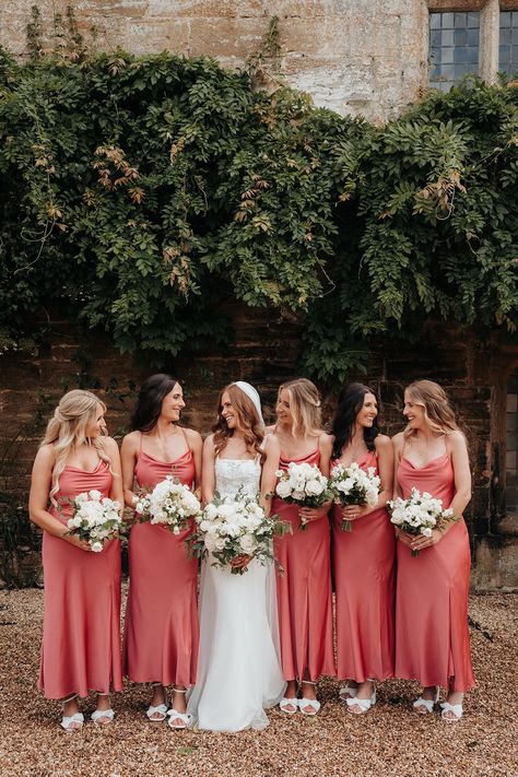 Bridal party wearing coral pink bridesmaid dresses with white Loeffler Randall bow shoes Fancy Bridesmaid Dresses, Long Bridesmaid Dresses With Sleeves, Dream Garden Wedding, Monochrome Colour Palette, Blue Bridesmaid Dresses Short, Bridesmaid Suits, Bridesmaid Dresses Blue, Bridesmaid Dresses Mismatched, Bridal Party Outfits