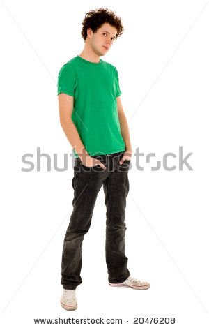 Young man standing with hands in pockets by Edyta Pawlowska, via ShutterStock Guy With Hands In Pockets Reference, Standing Hands In Pocket Pose, Man With Hands In Pockets Reference, Standing Poses Hands In Pockets, Dynamic Idle Poses, Hands On Pocket Pose, Pose Hands In Pockets, Awkward Standing Pose, Bad Posture Pose Reference