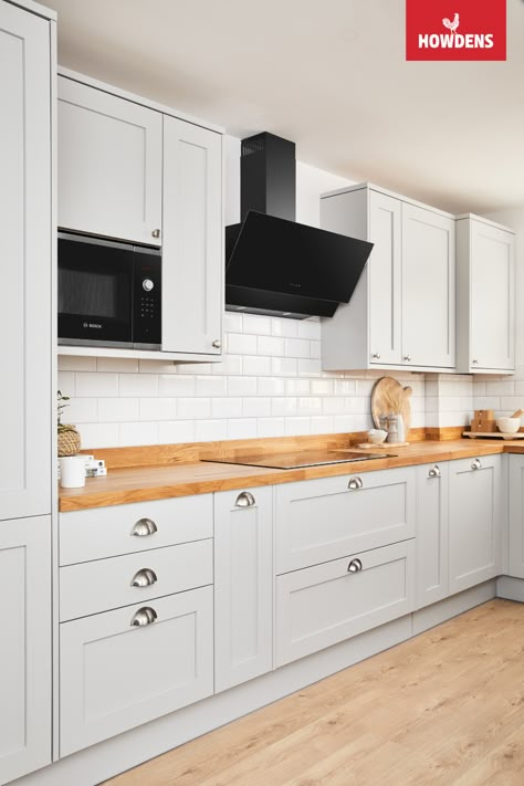 Light Grey Kitchen Inspiration, Pale Grey Kitchen Cabinets, Grey Shaker Kitchen Wooden Worktop, Howdens Shaker Kitchen Dove Grey, Kitchen Light Grey, Light Grey And Wood Kitchen, Grey Kitchen Wood Worktop, Neutral Shaker Kitchen, Kitchen Cupboard Colour Ideas