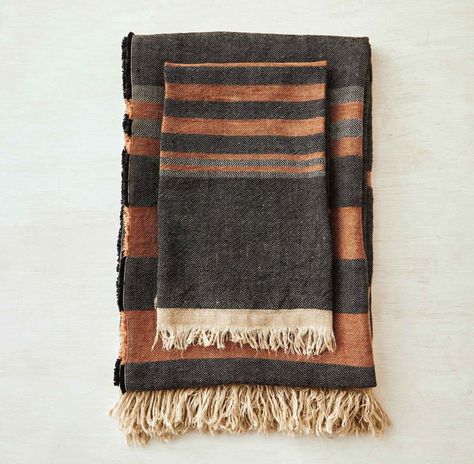 From Libeco Home, our favorite Belgian linen company, this multi-use linen textile is handwoven in a tweed and herringbone pattern in black with earth brown stripes, and is bordered on both ends with a lovely soft fringe. This "Fouta" has been pre-washed, lending it a soft yet dense hand, and making it a really beautiful textile. Handwoven Belgian Linen Fouta - Black StripePerfect as a luxurious bath towel, a beach towel, a table cover, a throw t Soft Fringe, Linen Hand Towels, Bath Towels Luxury, House Supplies, Belgian Linen, Linen Towels, Taos, Linen Textile, Herringbone Pattern