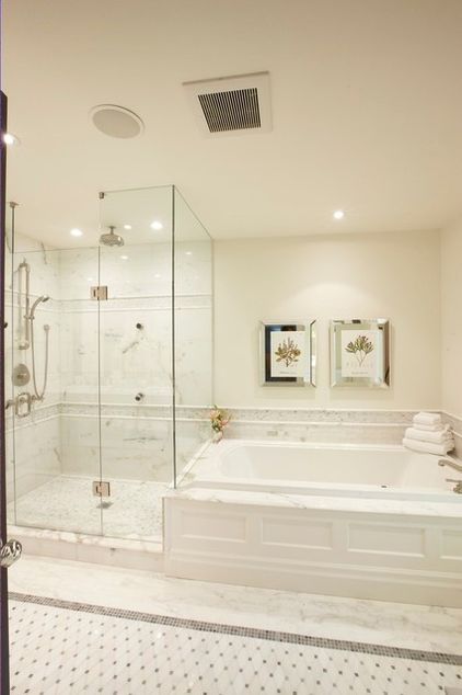 Mirrored frame artwork turns on the glam above this soaker tub for two. Bathroom Ideas With Tub And Shower Separate, Master Bath With Separate Shower And Tub, Drop In Tub Master Bath, Tub Shower Next To Each Other, Shower Tub Separate, Tub Beside Shower Master Bath, Nature Inspired Master Bath, Separate Bath And Shower Ideas, Bathroom Tub And Shower Separate