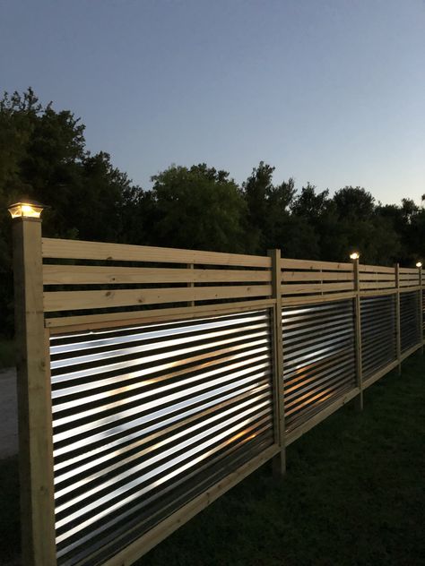 Privacy Fence Ideas Metal, Wood And Corrugated Metal Fence, Tin Privacy Fence Ideas, Corrugated Metal And Wood Fence, Corrugated Fence Ideas, Wood And Metal Fence Ideas, Metal Fencing Ideas Backyards, Tin Fence Ideas, Corigated Metal Fence Diy