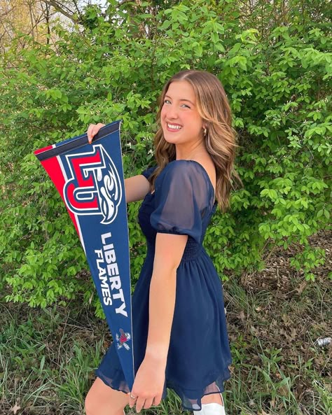 Senior Picture With College Shirt, Commitment Pictures College, Commited Pictures College, College Announcement Ideas Senior Pictures, Acceptance Letter College Pictures, Liberty University Outfits, College Announcement Photoshoot, Liberty University Graduation Pictures, Senior Picture Ideas College Shirt