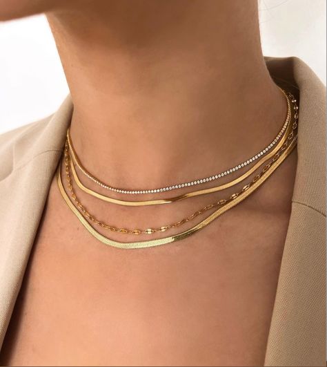 Dainty gold necklaces stacked to create a more polished look. #goldjewellery #goldnecklaces #necklacestack @shopccluxury Stacked Tennis Necklace, Tennis Necklace Stack, Necklaces Stacked, Necklace Gold Jewelry, Necklace Stack, Herringbone Chain, Minimal Necklace, Stacked Necklaces, Snake Necklace