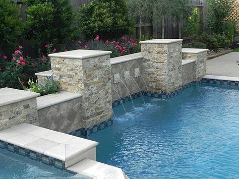 -  Stone for columns, tile on the raised beam, and water color Travertine Pool, Pool Finishes, Pool Renovation, Pool Colors, Pool Fountain, Pool Service, Backyard Pool Landscaping, Dream Pools, Florida House