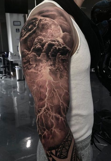 Electrifying lightning rolling clouds arm tattoo Cloud Tattoo Sleeve, Blitz Tattoo, Stammestattoo Designs, Storm Tattoo, Sky Tattoos, Lightning Tattoo, Army Tattoos, Tattoo Filler, Tattoo Background