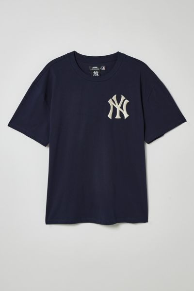 Tee by Pro Standard with a New York Yankees logo embroidered at the left chest. Cotton jersey t-shirt in a standard fit with short sleeves & a ribbed knit crew neck.Features Content + Care. 100% Cotton Machine wash Imported Size + Fit. Model is 6'0" and wearing size Medium Measurements taken from size Medium Chest: 22" Length: 29" T Shirt Inspiration, Shirts To Buy, Wishlist Clothes, Self Care Shirt, Yankees Shirt, New York Yankees Shirt, T Shirt Outfits, Men Tees, Grafic Tees